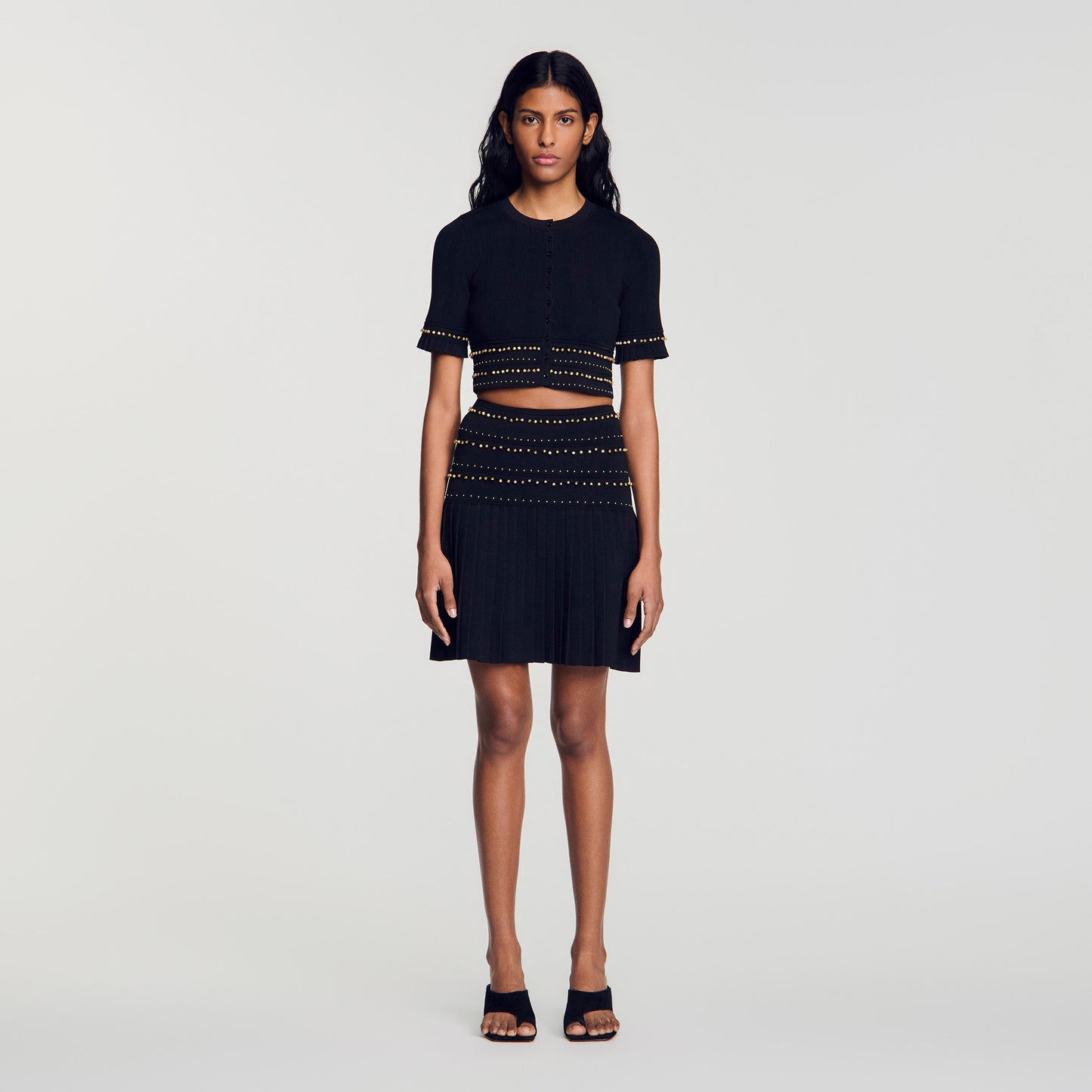 Loria Short skirt with tassels Black