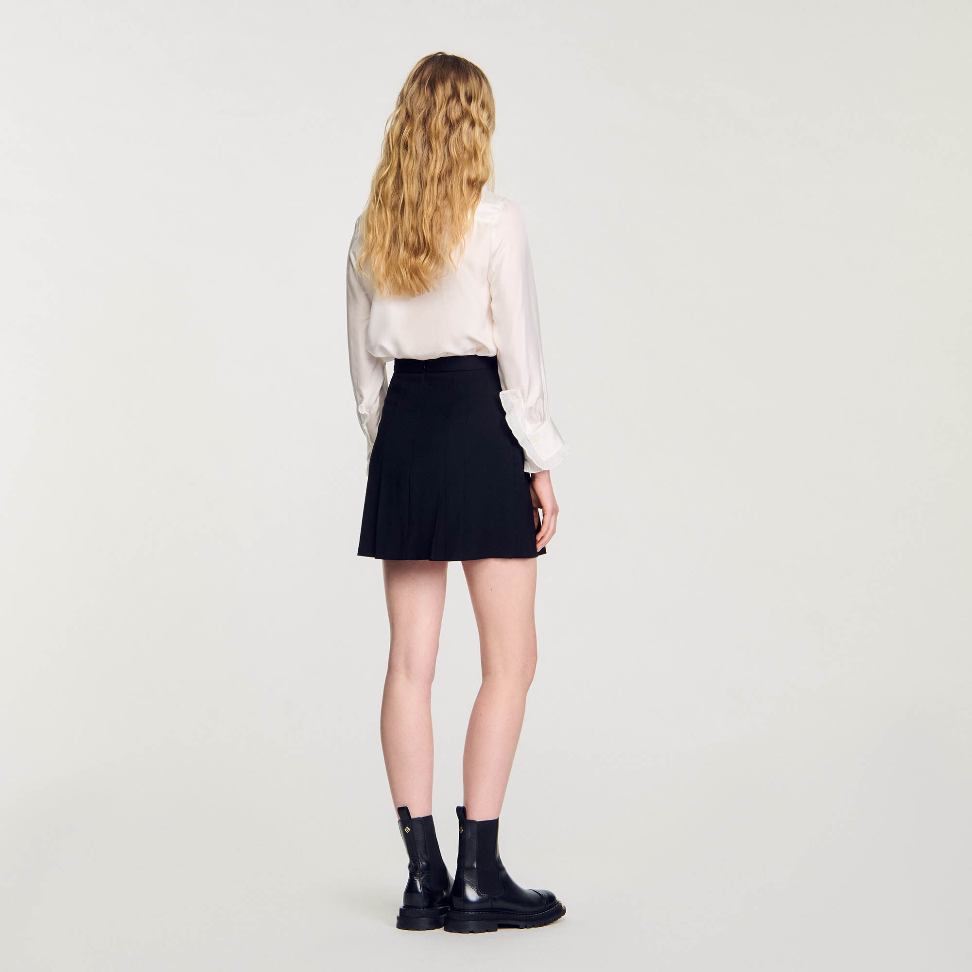Short Skirt With Stitched Pleats Black