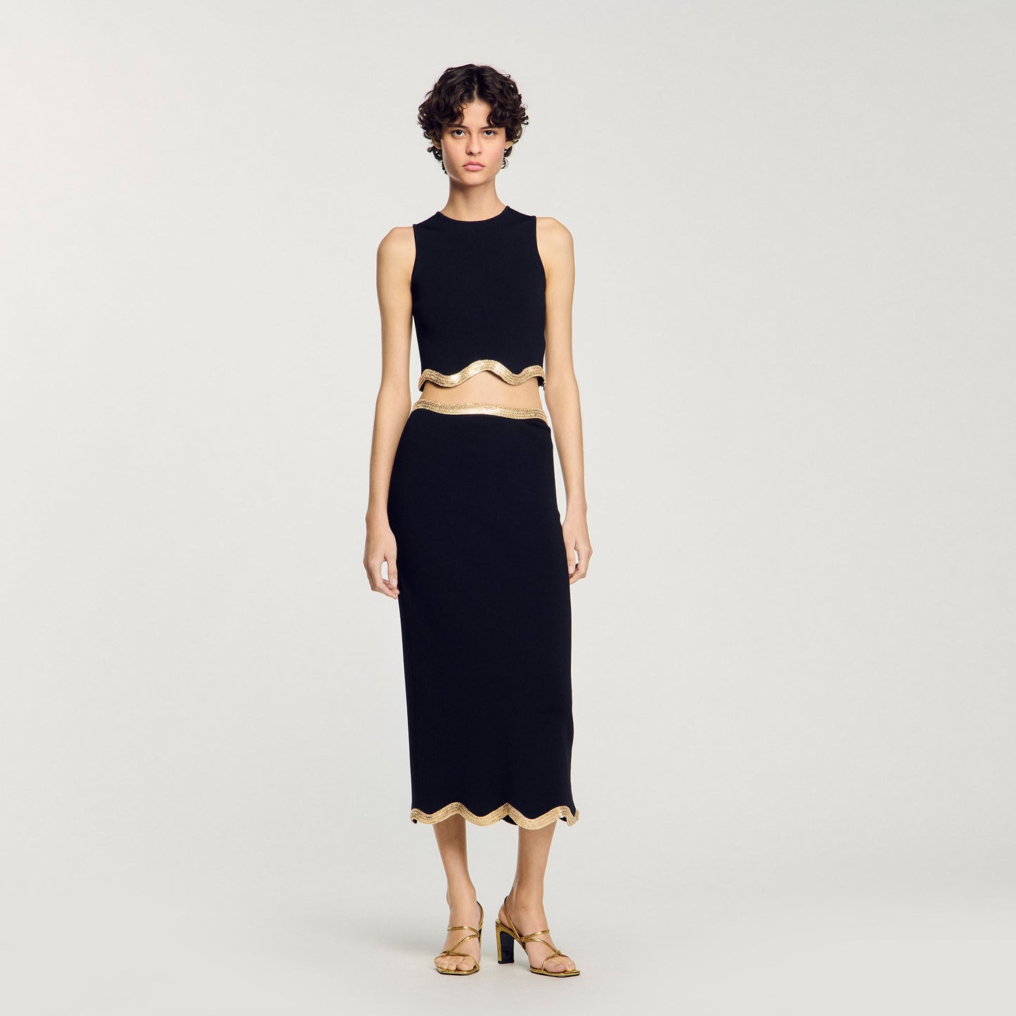 Black Long Knitted Skirt With Chain Detail
