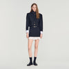 Olivandra Short striped ruffled skirt Black