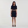 Loria Short skirt with tassels Black