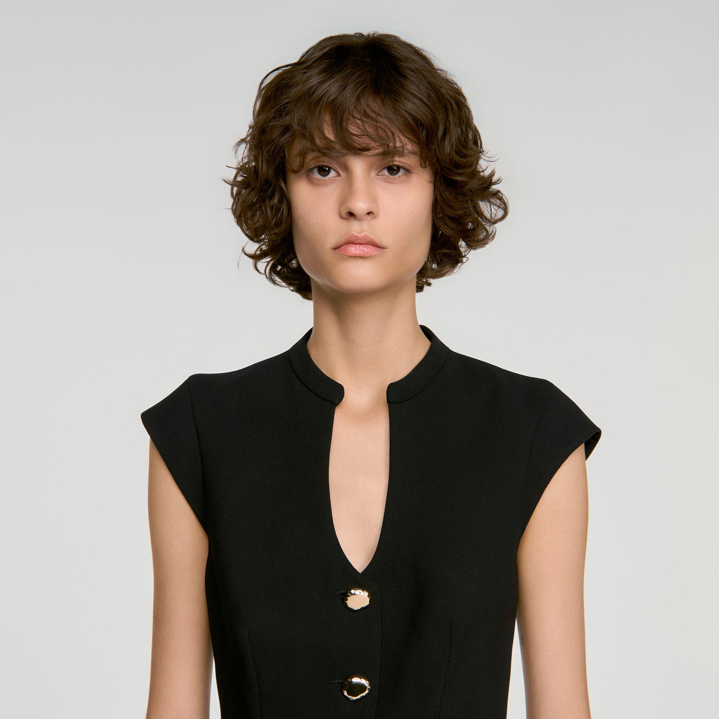 Britty Buttoned peplum top Black